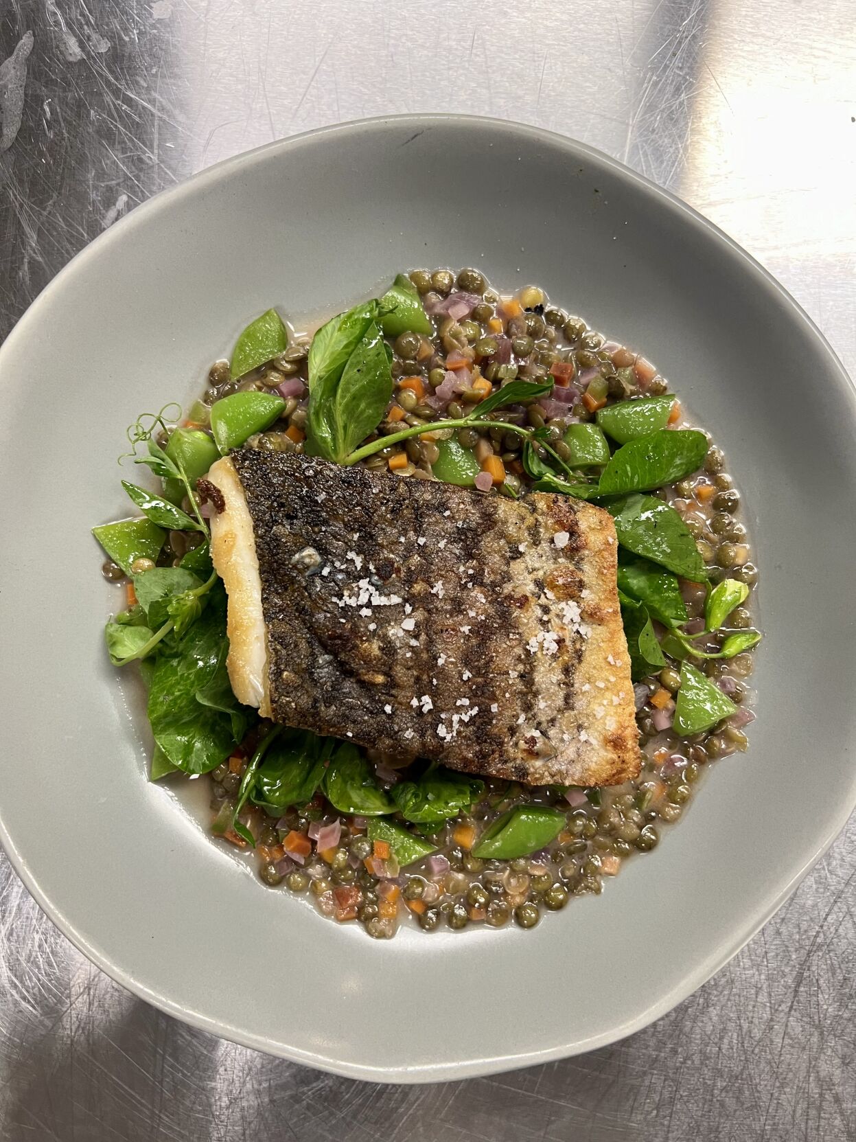 PHOTO 5_ Dry Aged Baja Striped Bass, French Green Lentils, Spring Vegetables, Lemon. Photo courtesy of Teotl.jpeg