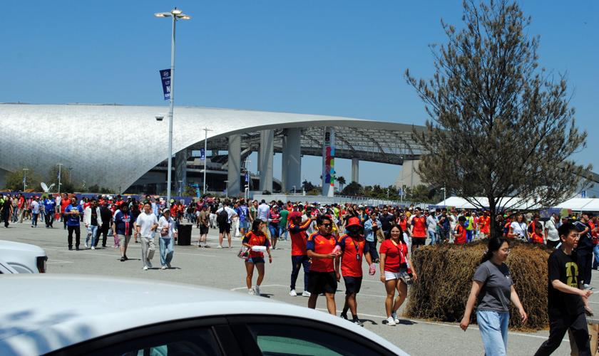 Fans exit Spain-Belgium game LA Stadium 2.jpg