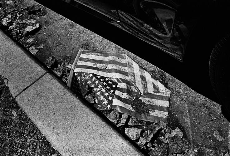 A plastic US flag discarded - Capital & Main