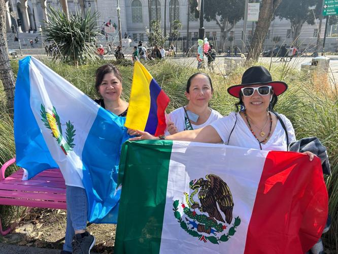 Why are people waving Mexican, Guatemalan flag?