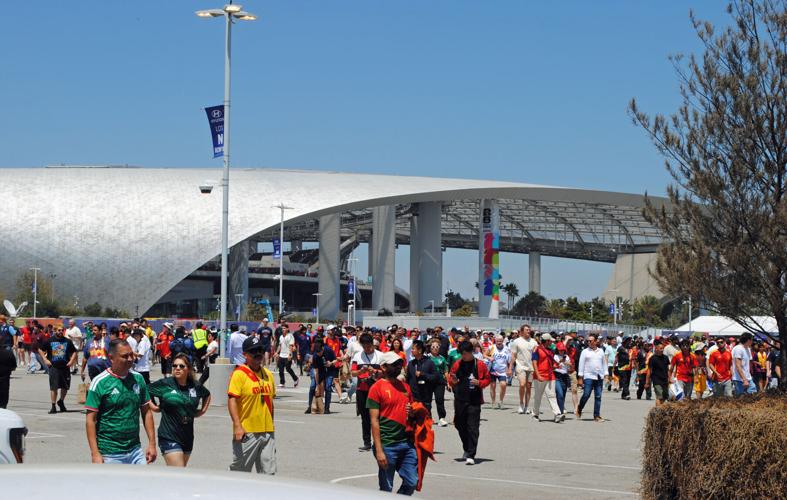 Fans exit Spain-Belgium game LA Stadium 1.jpg