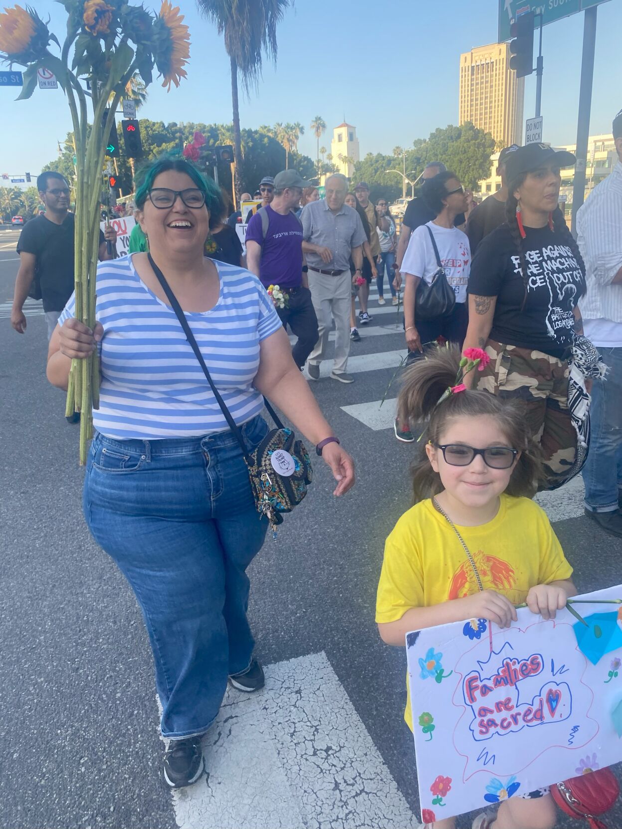 Mercedes Castro attended the vigil for family unity with her 6-year-old daughter.jpg