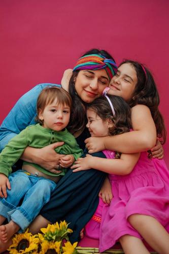 PHOTO-5-Leslie-Priscilla-and-her-three-children-Courtesy-of-Karissa-Raya1