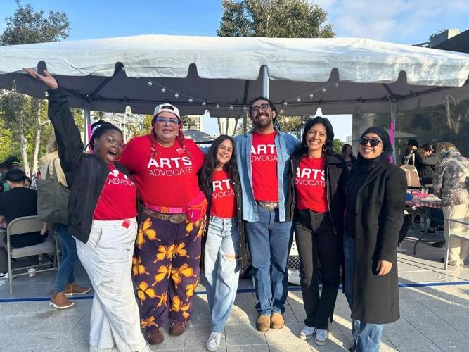 PHOTO 5_ Arts for LA staff pose with members of Arts for LA's ACTIVATE Emerging Arts Leaders at an art activation they created and hosted during Music Center LA's _On the record_ vinyl fair on May 4, 2024. Photo c.jpg