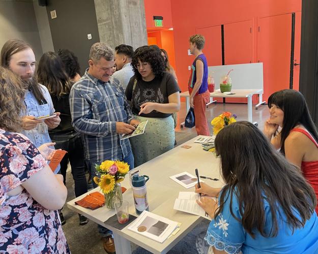 Angelica Maria Barraza Tran and Alexandra Martinez Poetry Prize Winners Signing Books.jpeg