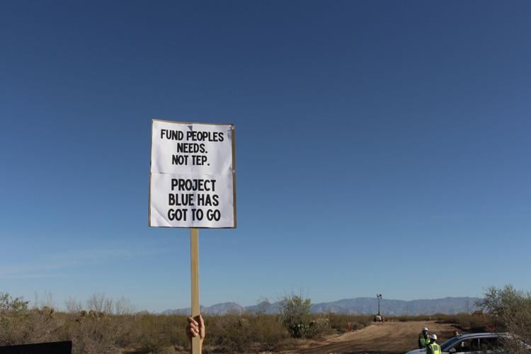 Sign held up high.JPG