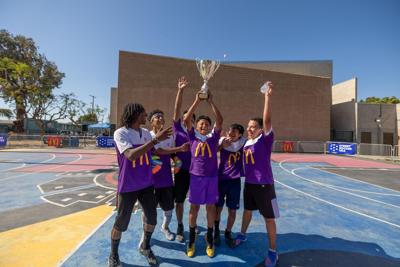 Young-footballers-lifting-the-tournament-trophy-Courtesy-of-ImagerybyOscar