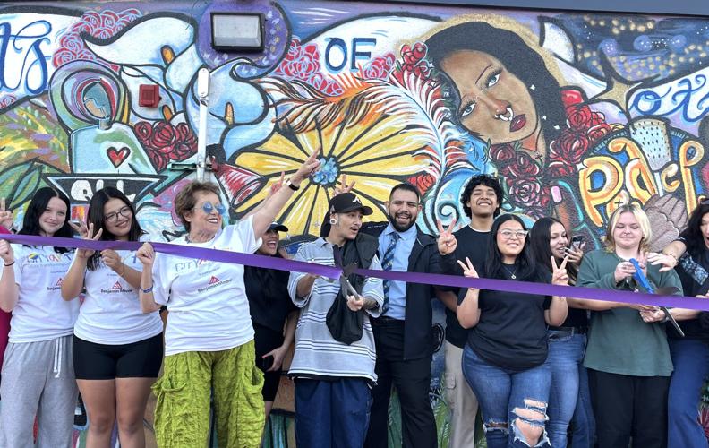 “Peace Wall” mural ribbon cutting
