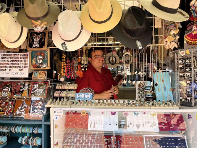 4-Store-Manager-Pablo-Sanchez-sits-behind-the-counter-of-his-family-owned-store-Andreas-Gift-Shop.-Aug.-26-2023_Photo-by-Marcos-Franco