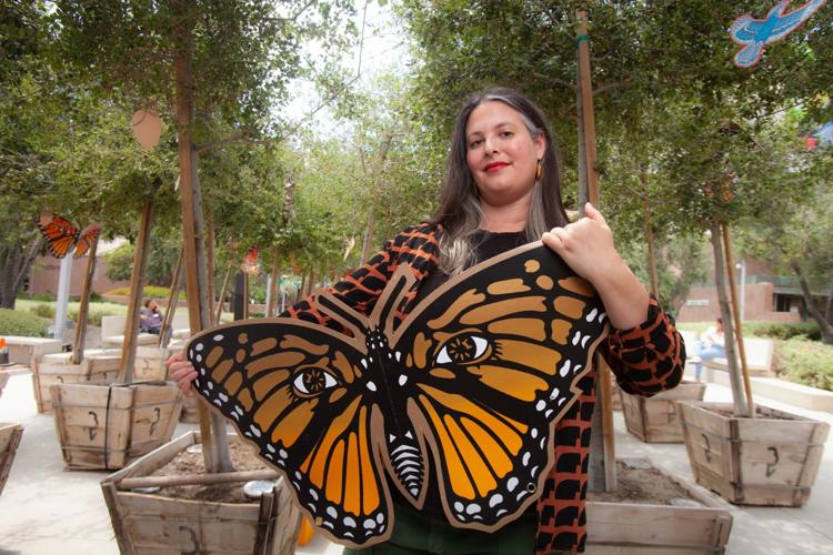 PHOTO 1_ Sonia Romero with her temporary installation _In Kinship with the Oak_ (2022) in Grand Park. Photo courtesy of Sonia Romero.jpg