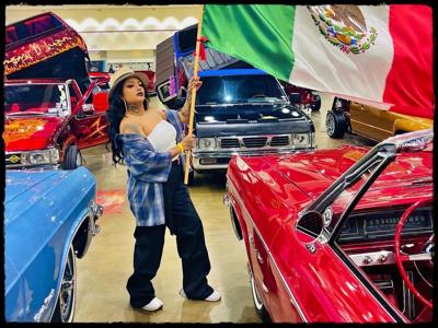 Guadalupe Castillo at a car show modeling calo news main3