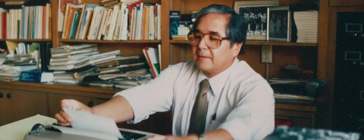 tomas-rivera-at-desk.jpg