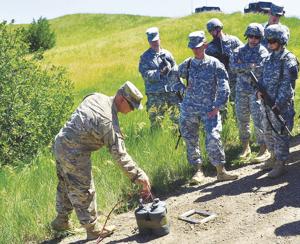 Members of military work on service projects in South Dakota