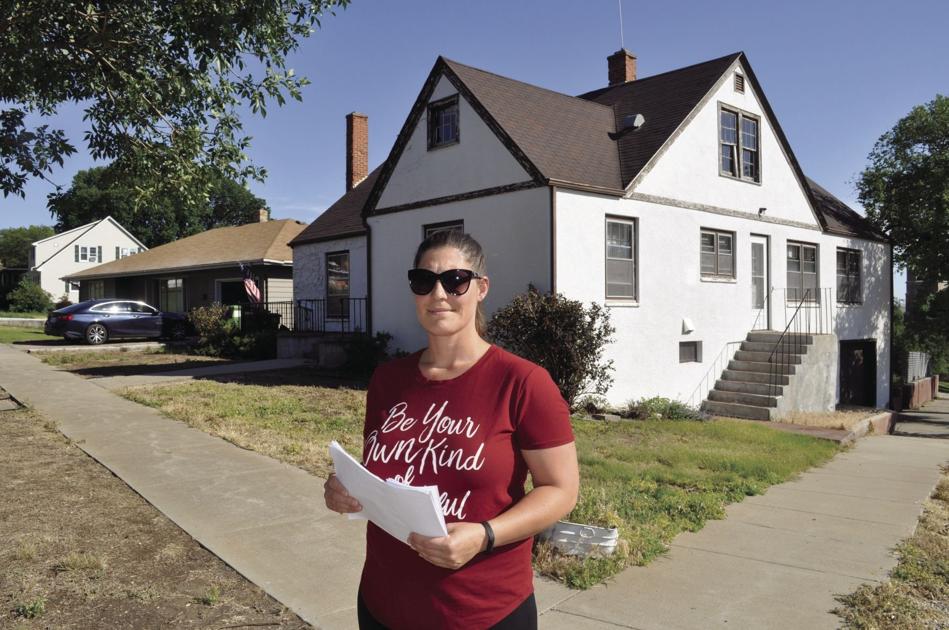 Woman mounts petition drive to stop plan for halfway house for exinmates of women’s prison in