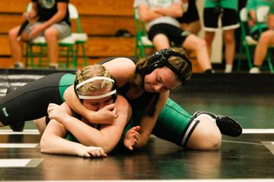 larson emalee mary wrestling classes weight girls capjournal crossface wrestle offs manuever performs governor nov during