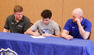 Pierre’s Tyson Johnson signs to wrestle at DWU