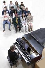 Our Town chorus and Kasdorf at piano