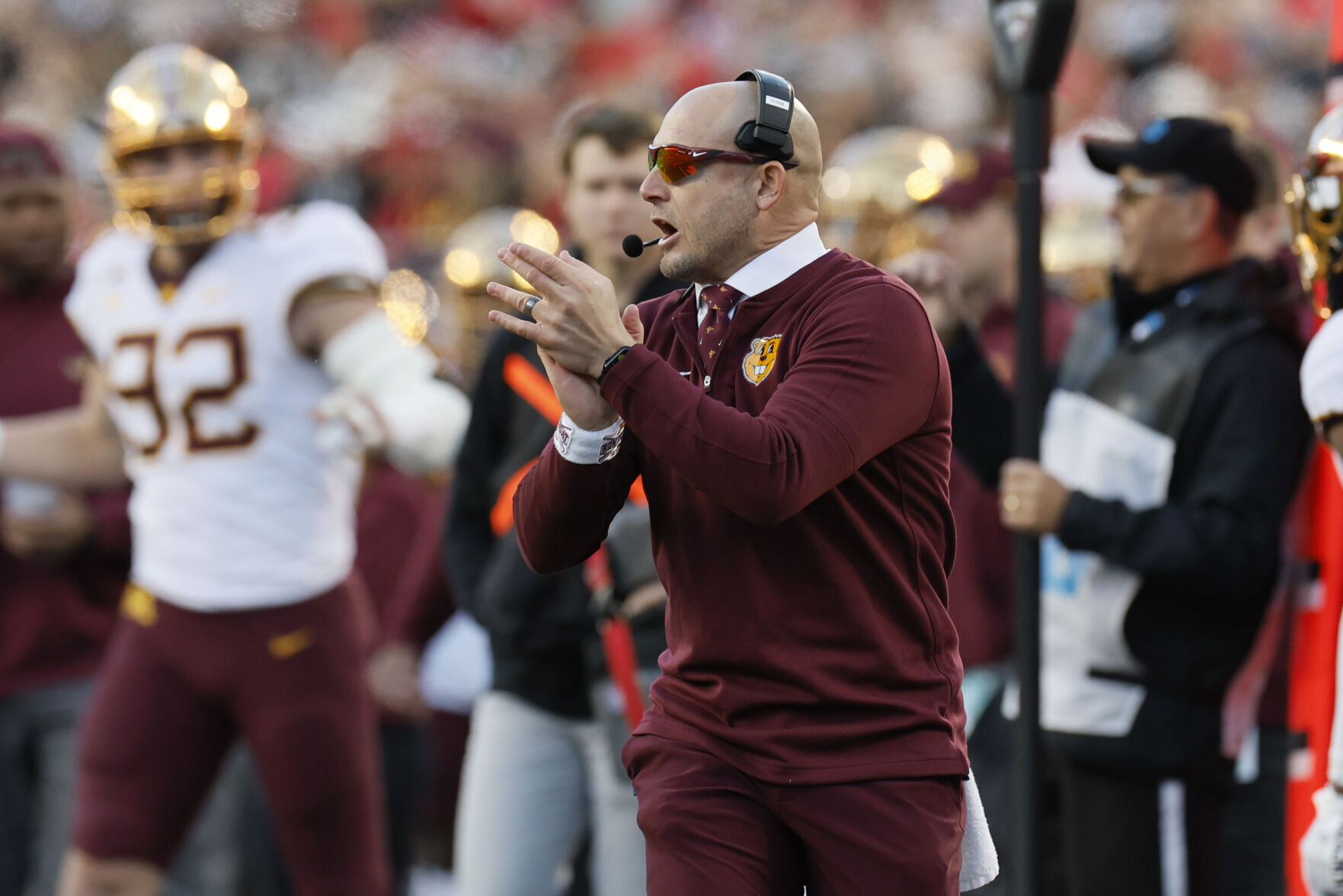 Badger football s Fickell gets a break as Gophers Fleck gets