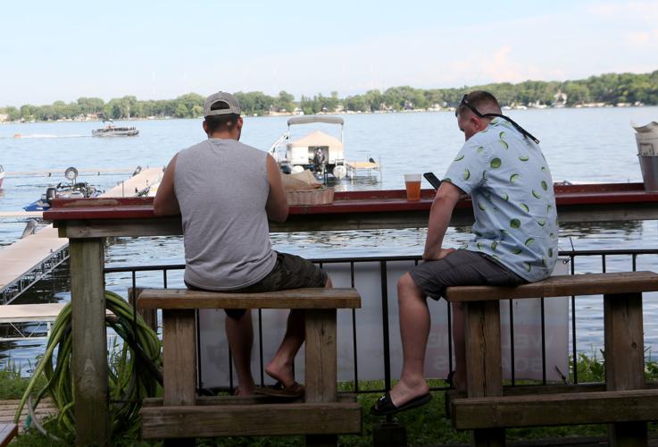 Every summer on Lake Waubesa, pontoons pack ’em in at Christy’s Landing Food & Drink