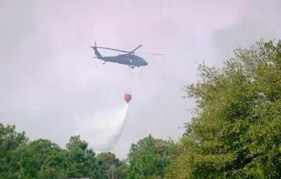 Crews battle wildfires in North and South Carolina amid dry conditions ...