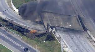 Philly re-opens I-95 with all city team mascots on a fire truck