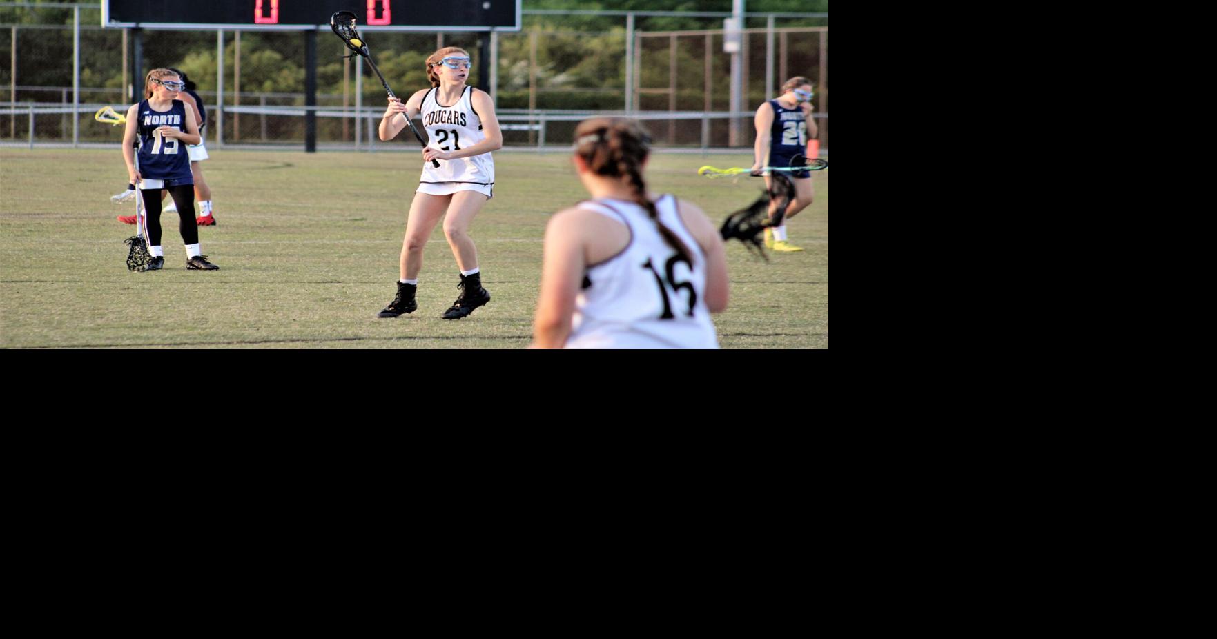 Girls lacrosse joins boys in four quarters of play instead of two