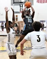 East boys fend off Croatan comeback for 62-54 win; Cougars trail by 19 in fourth before rallying