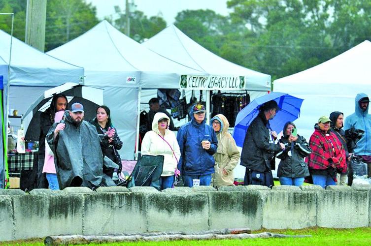 Html Brave Fans, competitors brave rain, wind to attend Crystal Coast Highland ...