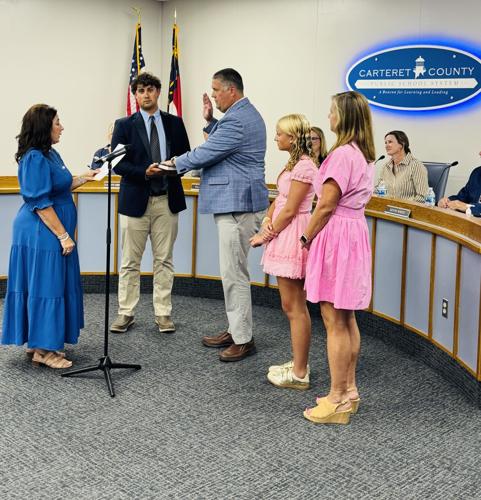 Johnson sworn in as new school board member