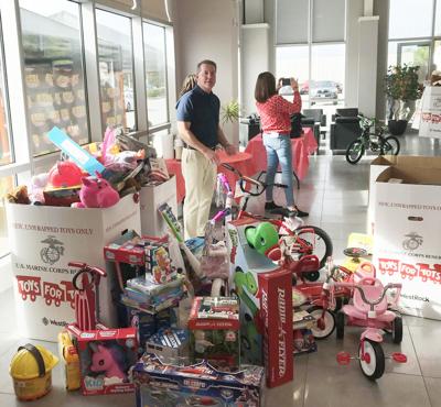 PHOTO: Dealership gives to The Salvation Army's Christmas drive