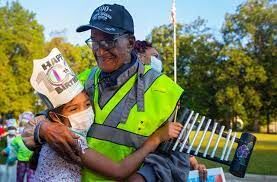 NC school surprises crossing guard on his 100th birthday ...