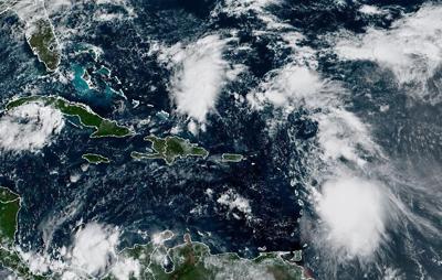 High tides raise flood risk in Carolinas as tropical storms churn in ...