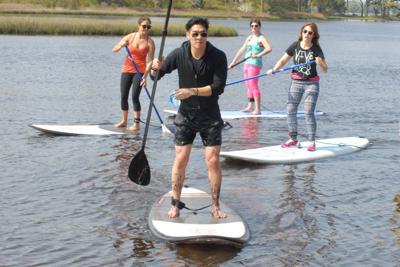 With a paddle