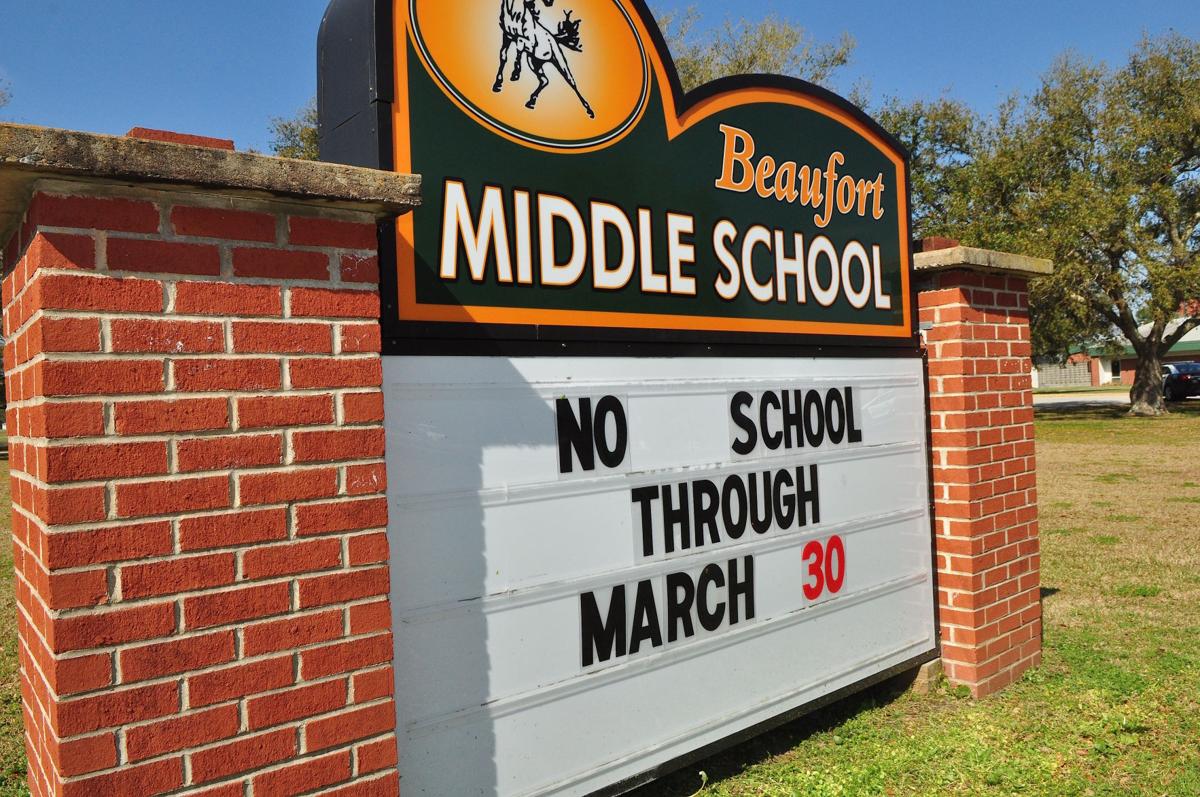 School employees join forces to feed children during closure News