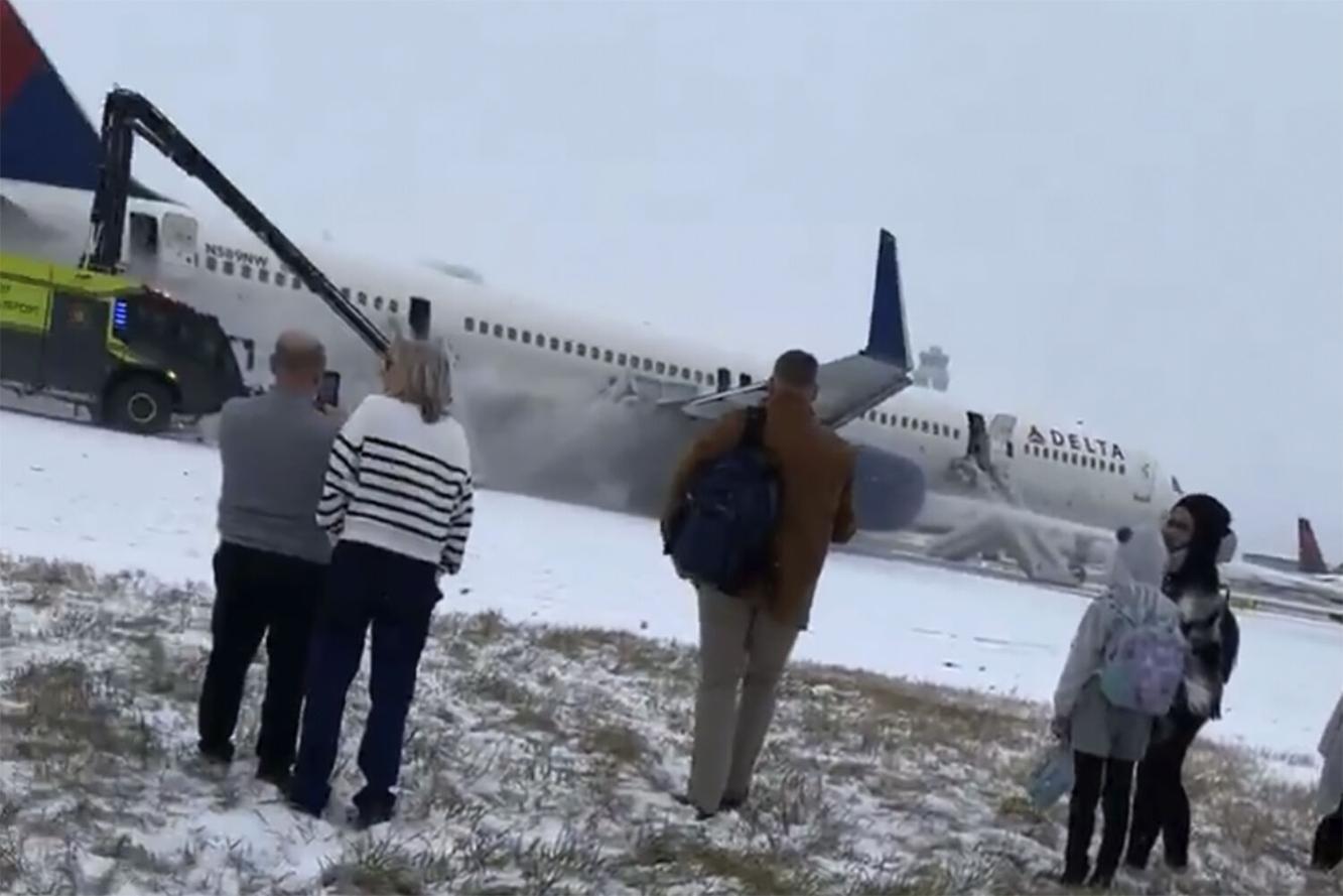 Delta Airlines plane flips on landing in Toronto and a badly hurt child