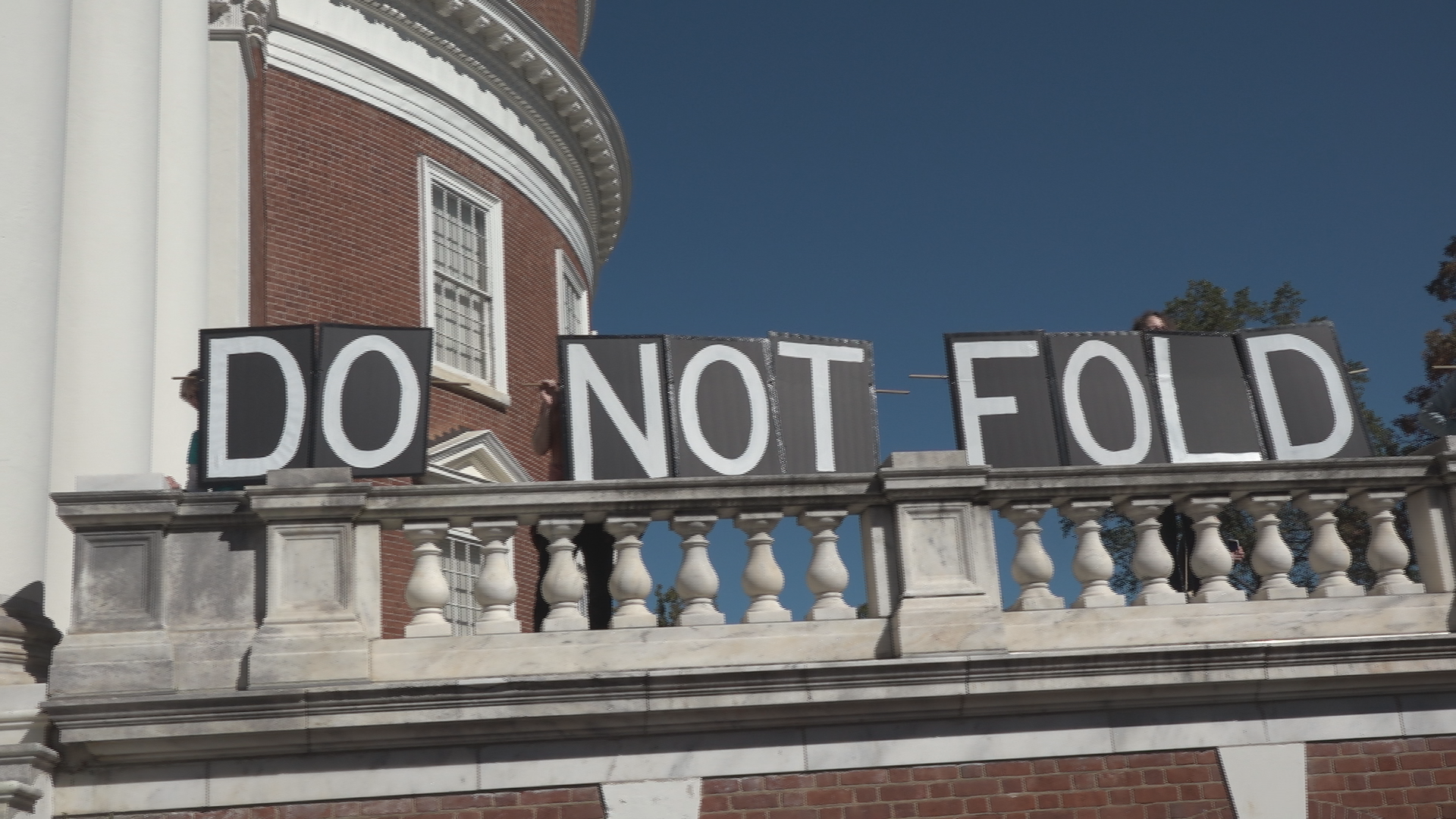 Rally at UVA opposes proposed federal compact