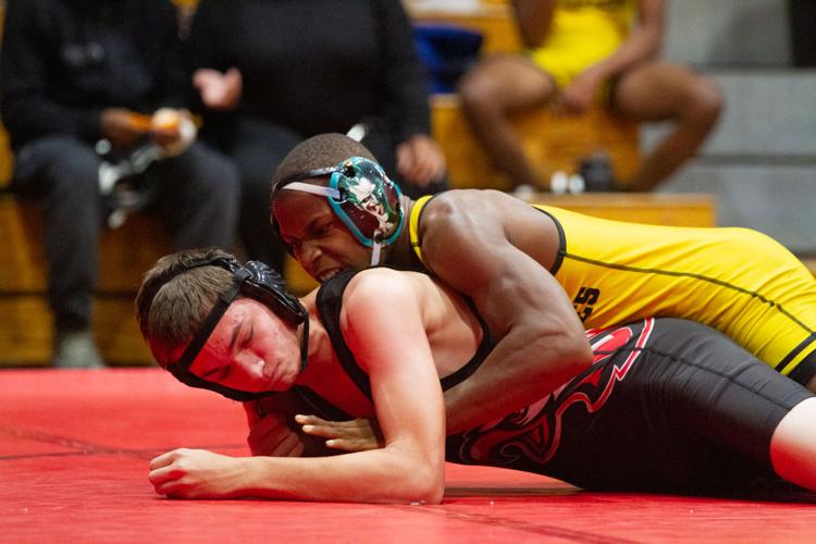 BATTLE AT THE BRIDGE Three Cecil wrestlers place in top four at Bo