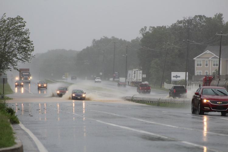 Tropical Storm Isaias downs trees, wires; floods roads | Emergency ...