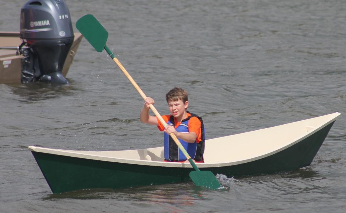 Boat building students launch 'six-hour canoes' Local ...