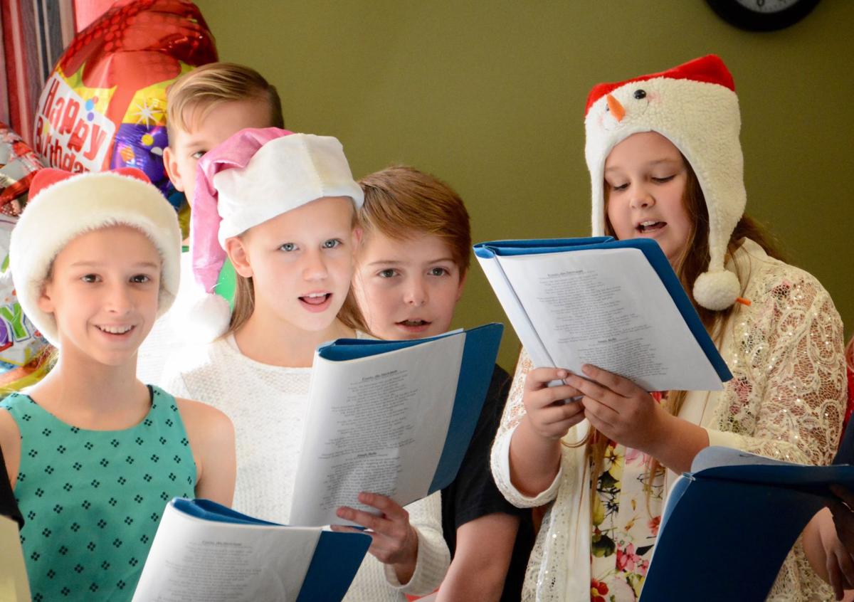 Leeds Elementary chorus spreads holiday cheer Local News