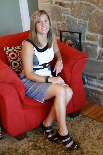 Stepping Out: State Farm agent goes from dresses to jerseys Misc