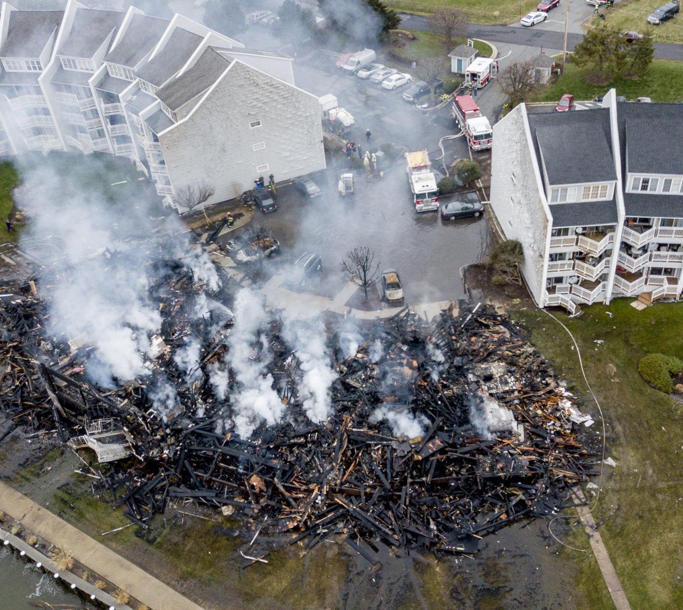 Threealarm fire destroys Perryville condos, four injured Police and