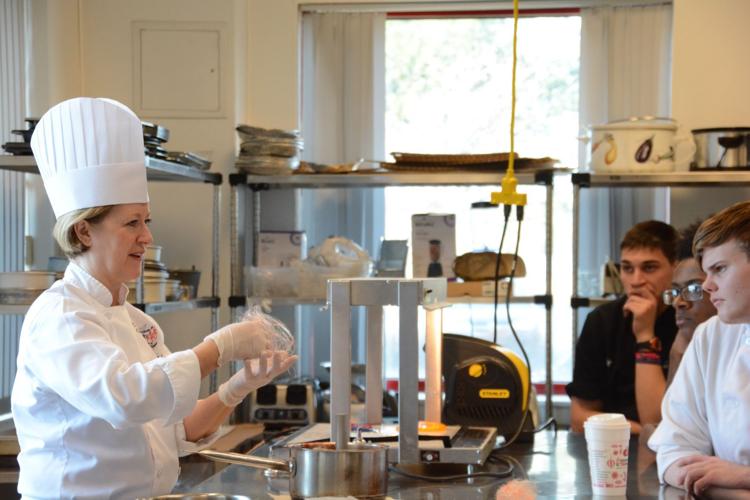 Culinary Olympian sculpts sugar creations during tech school ...