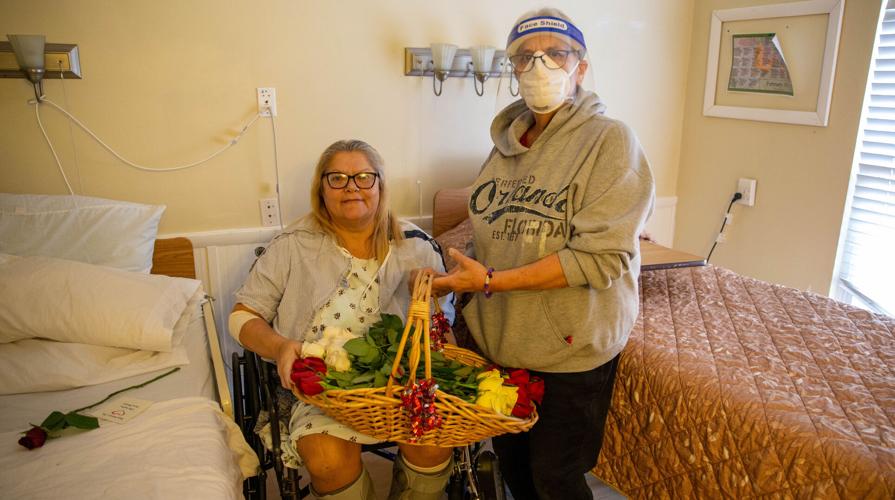 VFW members hand out Valentine's cards and flowers to Laurelwood