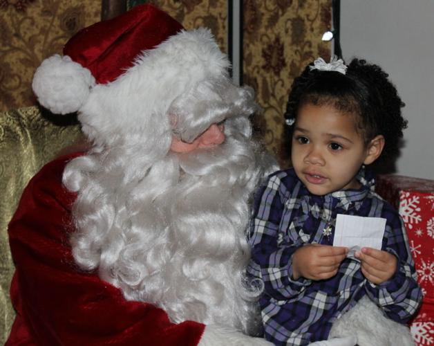 Only thing missing was the snow as Elkton lights Christmas trees