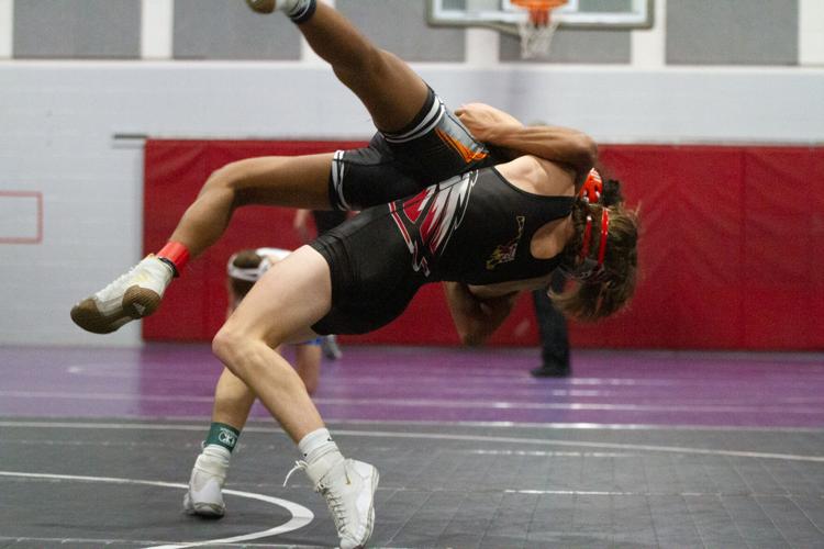 BATTLE AT THE BRIDGE Three Cecil wrestlers place in top four at Bo