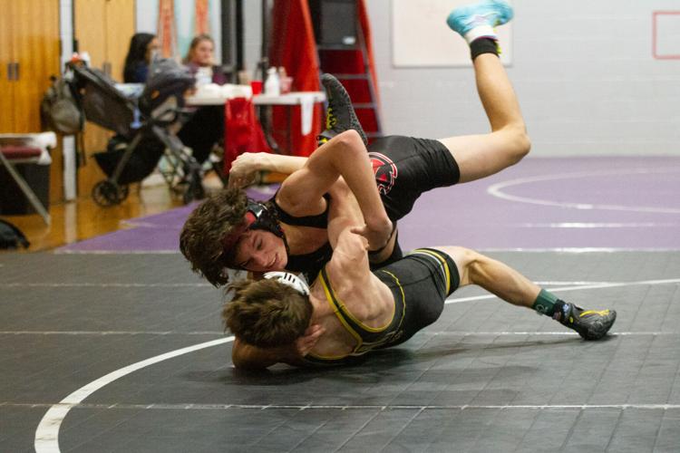 BATTLE AT THE BRIDGE Three Cecil wrestlers place in top four at Bo