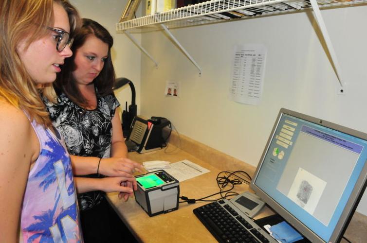On the job: Fingerprint technician Business cecildaily com