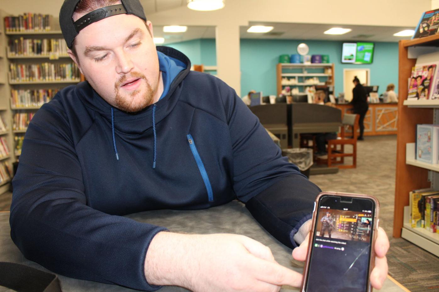 Local gamer's marathon session benefits charity Features