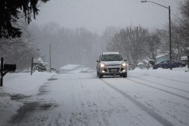 Snow to taper off Tuesday. Warming by the weekend | Local News ...